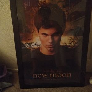 Im selling is a twiglight new moon poster in frame